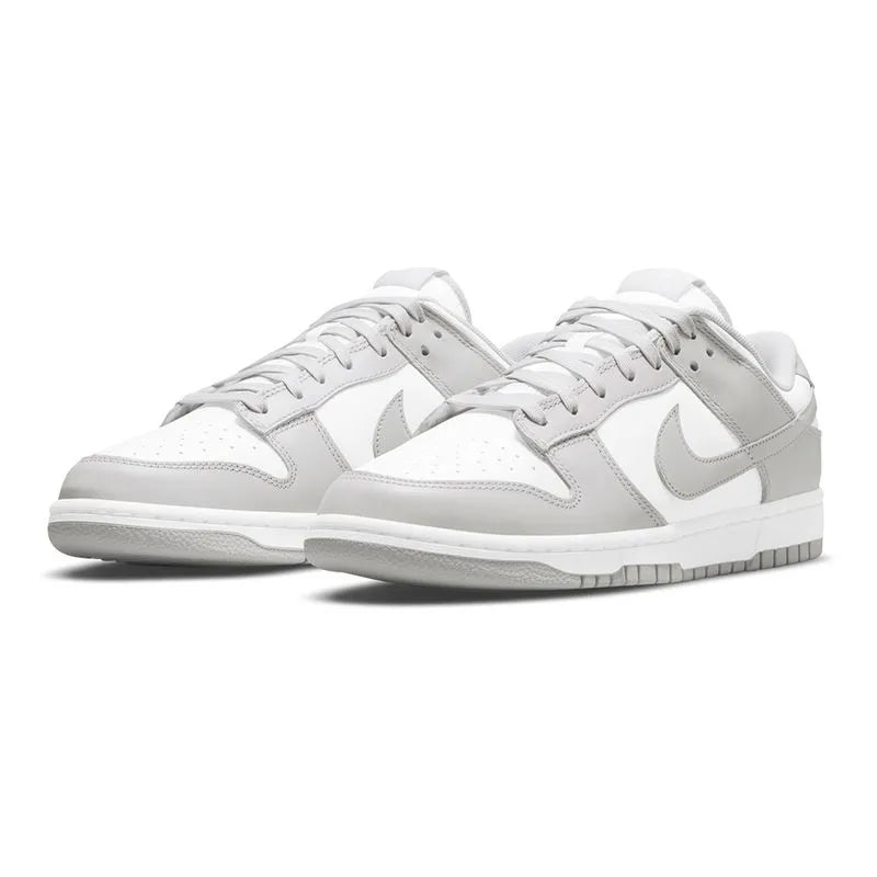 Tênis Dunk Low Retro Cinza - Sttyleira ImportsTênis Dunk Low Retro CinzaSttyleira ImportsSttyleira ImportsTênis Dunk Low Retro Cinza
